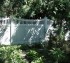 AFC Ames - Vinyl Fencing, Privacy With Sloped Rail Picket Accent 704